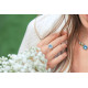 Blue cabochon solitaire halo ring with white pavé stones in sterling silver Elsa Lee Paris